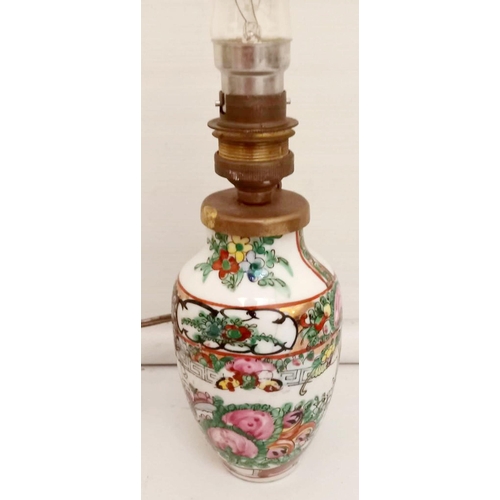 65 - AN EARLY 20TH CENTURY FAMILLE VERTE FLORAL DECORATED VASE LAMP, 17cm high, with four character mark ... 