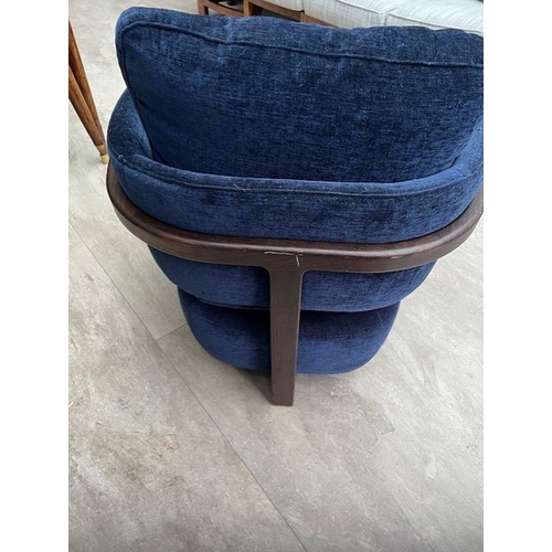 75 - A CONTEMPORARY PORADA ARMCHAIR, with beautiful blue velvet upholstery, and a stained beech frame. 83... 