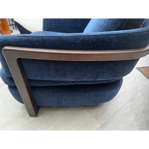 75 - A CONTEMPORARY PORADA ARMCHAIR, with beautiful blue velvet upholstery, and a stained beech frame. 83... 