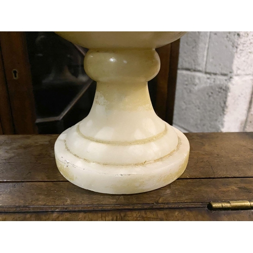 79 - AN ALABASTER URN VASE, heavy piece of traditional form on circular platform base. Dimensions: 25.5cm... 