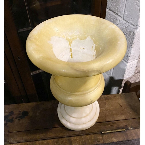 79 - AN ALABASTER URN VASE, heavy piece of traditional form on circular platform base. Dimensions: 25.5cm... 