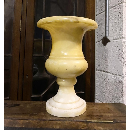 79 - AN ALABASTER URN VASE, heavy piece of traditional form on circular platform base. Dimensions: 25.5cm... 