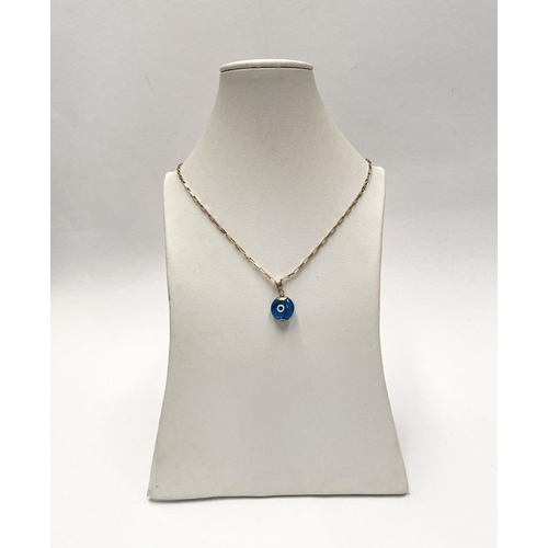 94 - A 9CT GOLD CHAIN EVIL EYE PENDANT NECKLACE, chain marked 9K to clasp. Dimensions: 26cm long approx.