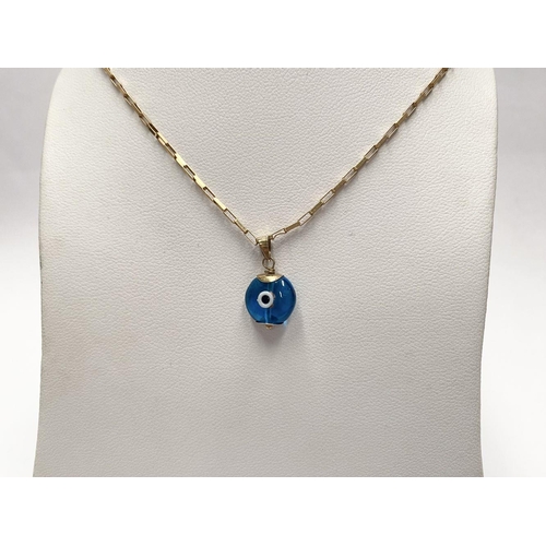 94 - A 9CT GOLD CHAIN EVIL EYE PENDANT NECKLACE, chain marked 9K to clasp. Dimensions: 26cm long approx.