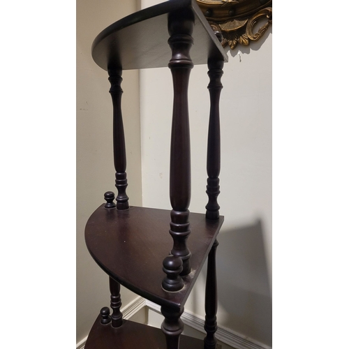 104 - A GOOD QUALITY FOUR TIER BOW FRONTED CORNER ‘WHAT NOT’ UNIT, each of the curved shelves raised on th... 