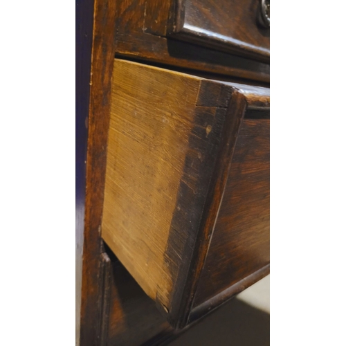 105 - AN EARLY 20TH CENTURY OAK FALL FRONT SECRETAIRE, the graduated fall front door with raised moulding ... 