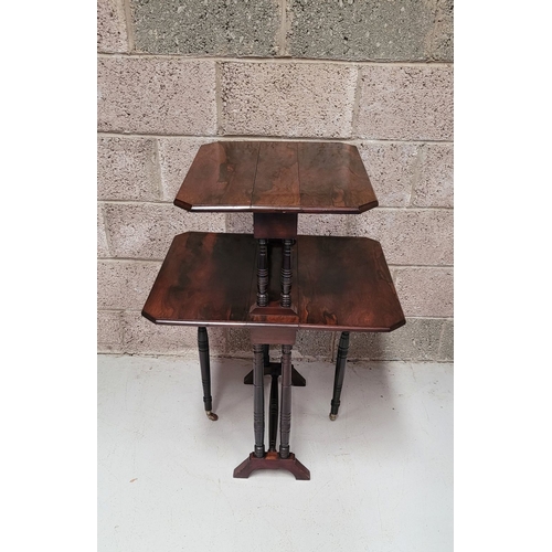 380 - AN EDWARDIAN TWO TIER ROSEWOOD DROP LEAF TABLE, with canted corners to each tier, the top tier raise... 