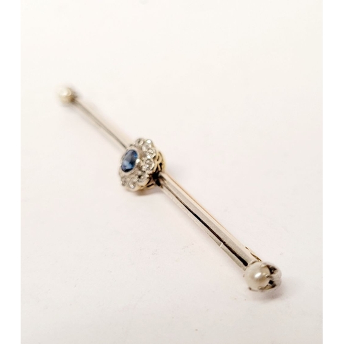 110 - A 15CT YELLOW GOLD & PLATINUM SAPPHIRE & DIAMOND BAR BROOCH, with a central raised crown setting hol... 