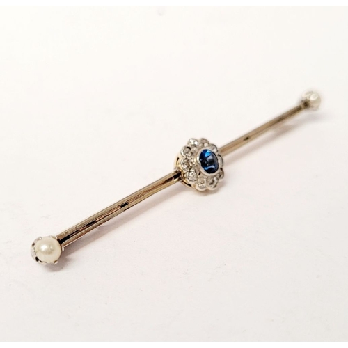 110 - A 15CT YELLOW GOLD & PLATINUM SAPPHIRE & DIAMOND BAR BROOCH, with a central raised crown setting hol... 