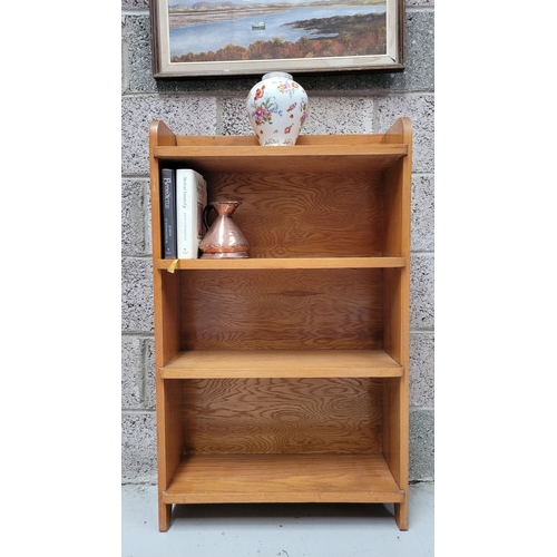 111 - A GOOD TEAK MID-CENTURY OPEN FLOOR BOOKCASE, with raised three-quarter gallery to the top. Possibly ... 