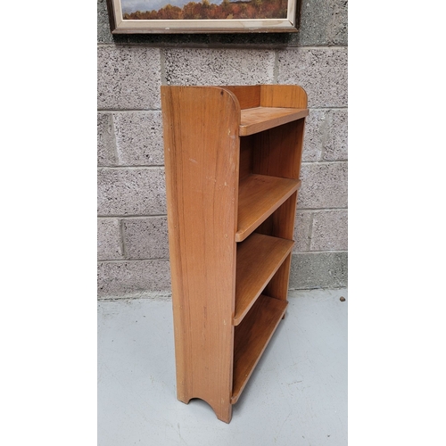 111 - A GOOD TEAK MID-CENTURY OPEN FLOOR BOOKCASE, with raised three-quarter gallery to the top. Possibly ... 