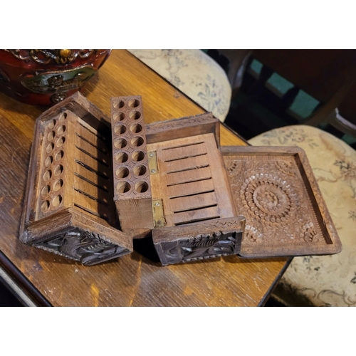 116 - A BEAUTIFUL HAND CARVED HINGED WOODEN HUMIDOR BOX, the exterior decorated with intricate carved deta... 