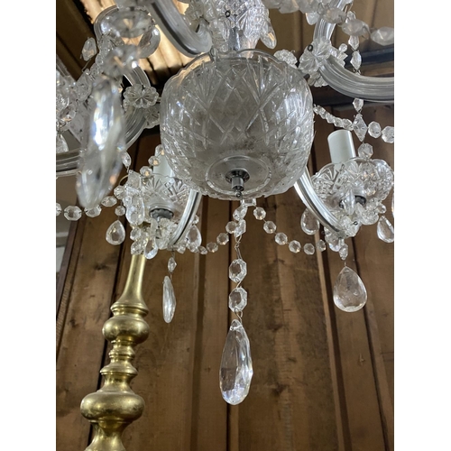 123 - A BEAUTIFUL CRYSTAL FIVE BRANCH CHANDELIER, with cut glass support, five scrolling branches with cut... 