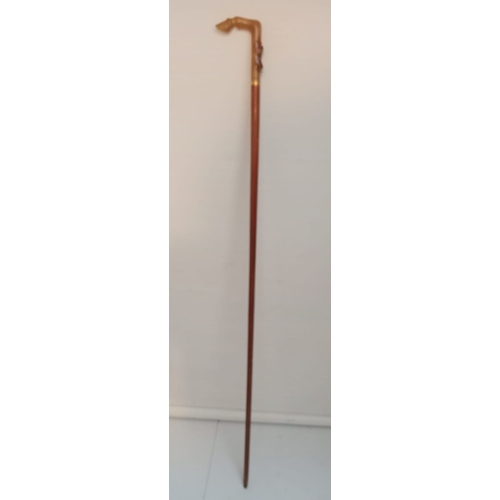 133 - A VICTORIAN HORN HANDLED WALKING CANE,  the handled formed as a horses hoof,  88cm long overall.