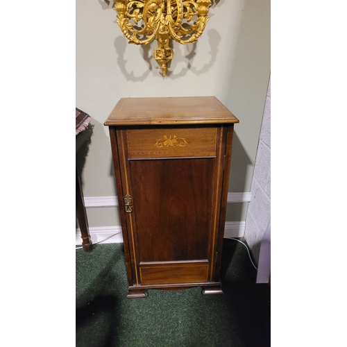 135 - AN EDWARDIAN MAHOGANY & SATINWOOD INLAID MUSIC CABINET, with inlay detail to the top & door; above t... 