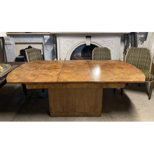 141 - AN EXCELLENT ART DECO WALNUT EXTENDING DINING TABLE WITH FOUR CHAIRS & TWO CARVERS, c.1940, the tabl... 