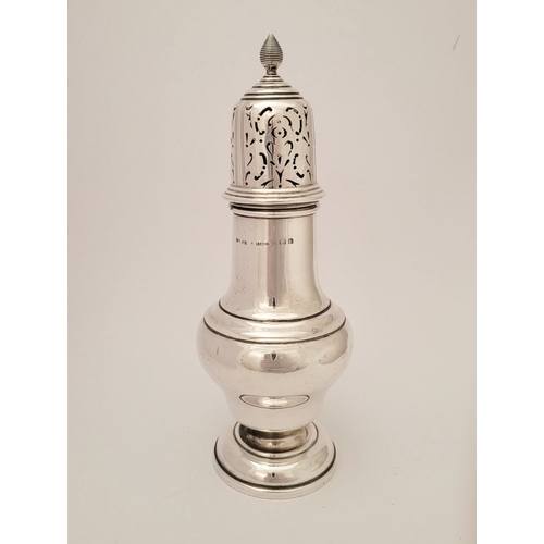 149 - AN EARLY 19TH CENTURY SILVER SUGAR CASTER, having pierced lid with finial to the tip, the body with ... 