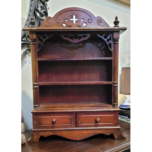 168 - A MINIATURE TABLE TOP OPEN SHELF, with pierced raised pediment to the top, over open shelves & a pai... 