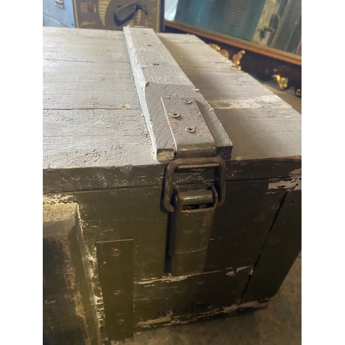 176 - AN VINTAGE HARDWOOD ARMY/AMMUNITION CRATE, with bindings to top, triple clasp opening and handles to... 