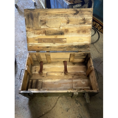 176 - AN VINTAGE HARDWOOD ARMY/AMMUNITION CRATE, with bindings to top, triple clasp opening and handles to... 