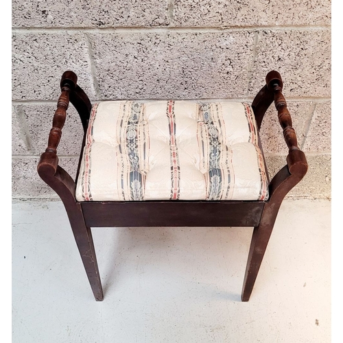 189 - AN ANTIQUE PIANO STOOL, with padded button topped lift away seat, on each side turned elbow rest han... 