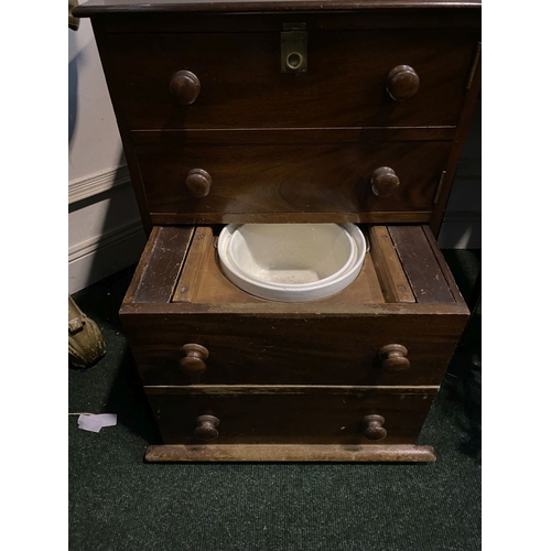 203 - A VICTORIAN MAHOGANY LIFT-TOP CABINET, date circa 1860, with turned handles