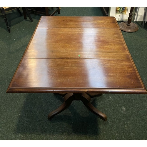 206 - A FINE MAHOGANY DROP LEAF WORK / SIDE TABLE, with one panelled drawer, supported by carved pod base ... 