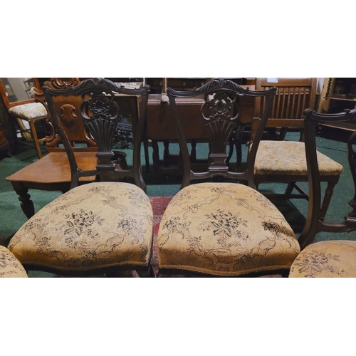 207 - A GOOD QUALITY SET OF FOUR EDWARDIAN DINING CHAIRS, each with a carved & pierced splat back & carved... 