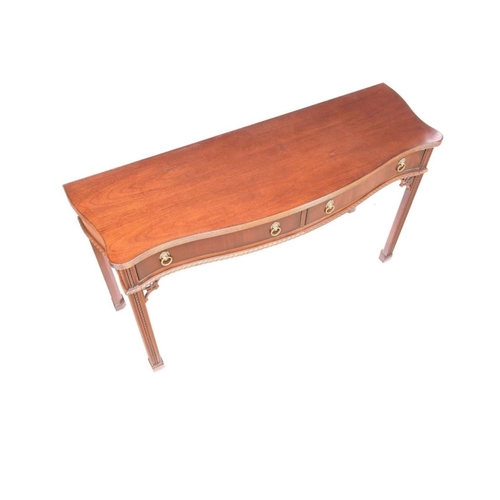 217 - A VERY FINE MAHOGANY SERPENTINE SHAPED CONSOLE / HALL TABLE, a lovely table with reed trim to the ta... 