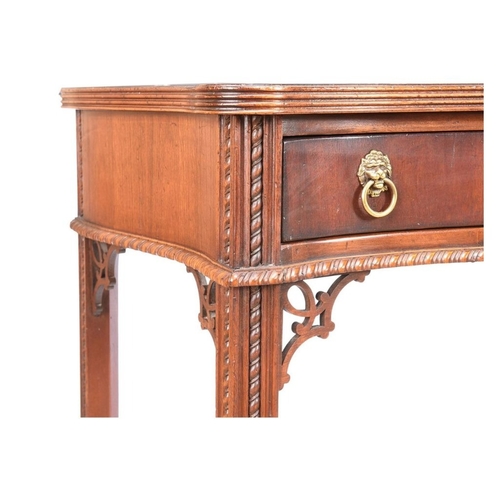 217 - A VERY FINE MAHOGANY SERPENTINE SHAPED CONSOLE / HALL TABLE, a lovely table with reed trim to the ta... 