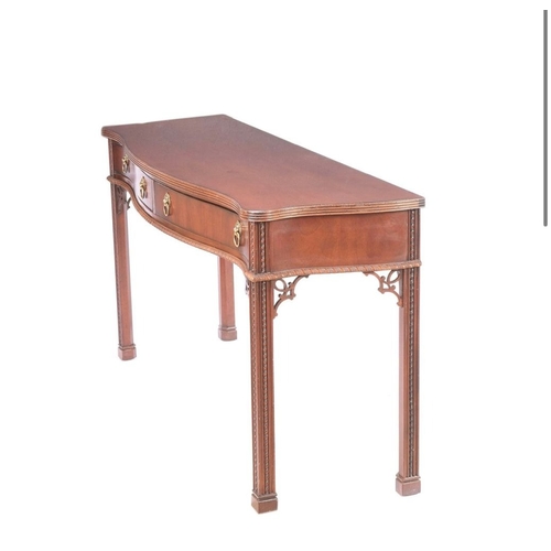 217 - A VERY FINE MAHOGANY SERPENTINE SHAPED CONSOLE / HALL TABLE, a lovely table with reed trim to the ta... 