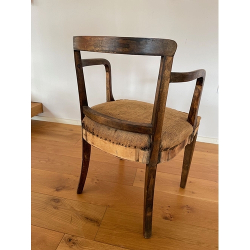 223 - A 19TH CENTURY ARMCHAIR, with curved top rail and rail below, standing on tapered leg to front, gent... 