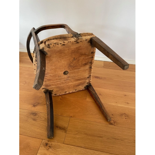 223 - A 19TH CENTURY ARMCHAIR, with curved top rail and rail below, standing on tapered leg to front, gent... 