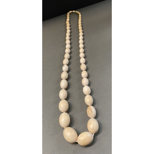 232 - TWO GRADUATED CARVED BONE NECKLACES ALONG WITH TWO HIGHLY CARVED BONE NECKLACES, the graduated pair ... 