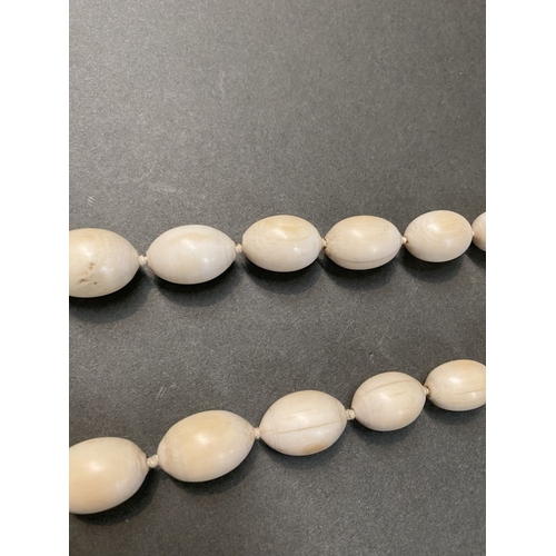 232 - TWO GRADUATED CARVED BONE NECKLACES ALONG WITH TWO HIGHLY CARVED BONE NECKLACES, the graduated pair ... 