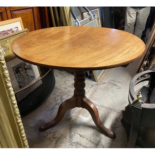 244 - A 19TH CENTURY MAHOGANY TIP UP TABLE, circular top on turned support atop tripod base with cabriole ... 