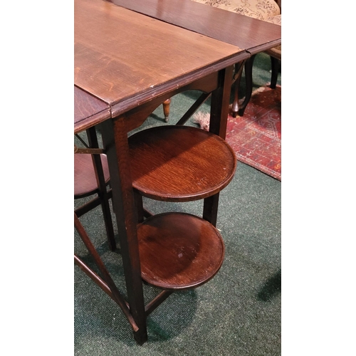 257 - A VINTAGE DROP-LEAF CAKE/SERVING TABLE, with drop leaves to the front & back & a pair of collapsible... 