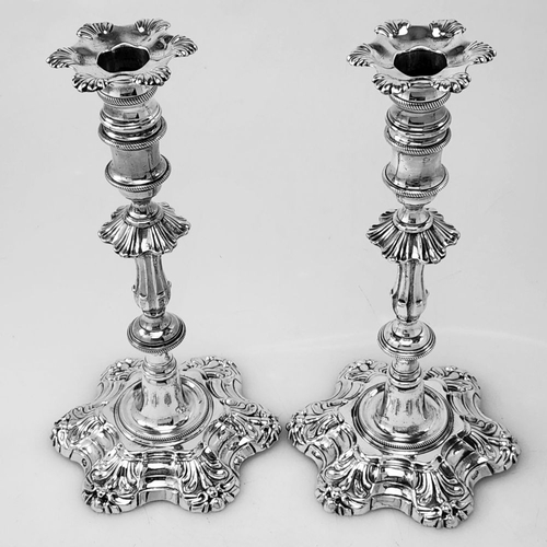 26 - AN EXQUISITE PAIR OF IRISH GEORGE II CAST SILVER CANDLESTICKS, Made in Dublin c.1750, Maker likely J... 