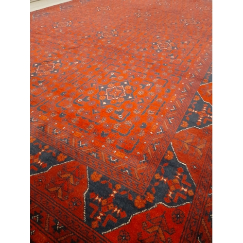 260 - AN AUTHENTIC AFGHAN KHAN MOHAMMADI RUG, hand-woven in the traditional Khan Mohammadi pattern in vibr... 