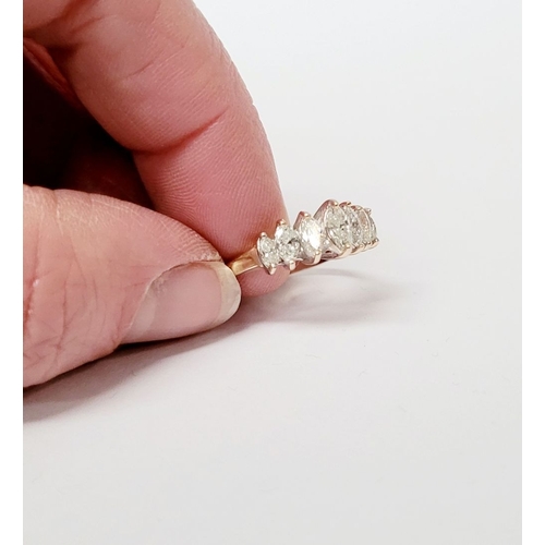 27 - A 14CT YELLOW GOLD SPARKLING SEVEN STONE DIAMOND RING, with marquise cut graduated set of diamonds i... 