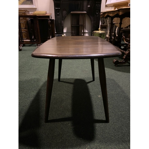 288 - A VINTAGE AUTHENTIC ERCOL COFFEE TABLE, with splayed legs, complete with Ercol label to underside. D... 