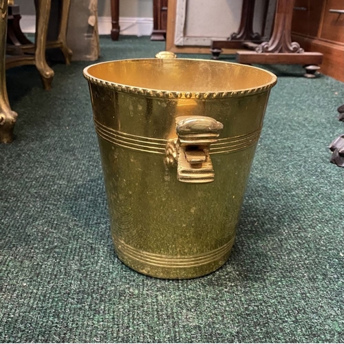 289 - A BRASS TWO HANDLED ICE BUCKET, with dragon handles to sides, beaded detail to top and embossed bind... 