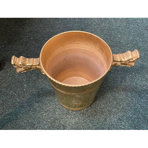 289 - A BRASS TWO HANDLED ICE BUCKET, with dragon handles to sides, beaded detail to top and embossed bind... 