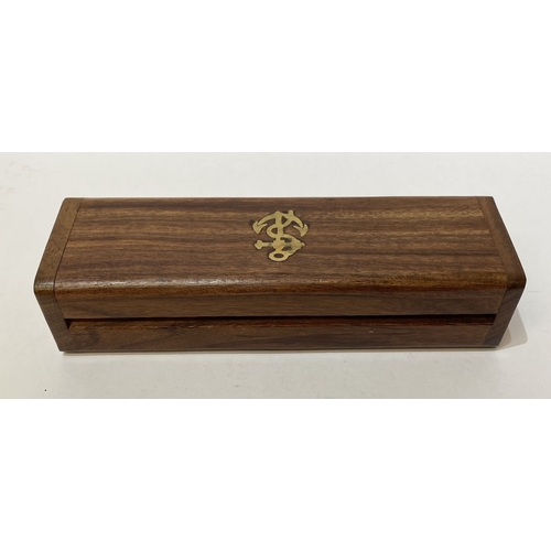 297 - A HARDWOOD BOX WITH BRASS ANCHOR MOUNT, with brass and copper boatswain whistle to interior. Dimensi... 