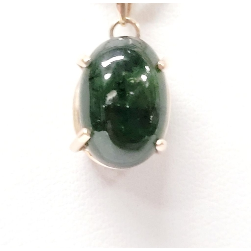 30 - A PRETTY 14CT YELLOW GOLD GREEN SAPPHIRE & DIAMOND PENDANT, the oval shaped cabochon cut natural gre... 