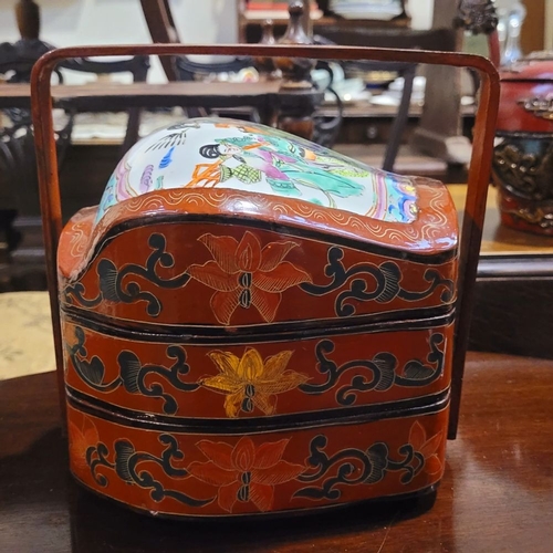 31 - A LOVELY VINTAGE THREE TIER PORCELAIN TOPPED CHINESE WEDDING BASKET, with curved handle, the top lid... 