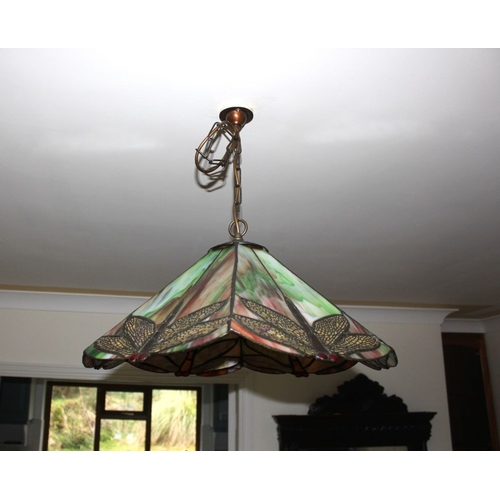 314 - A VINTAGE TIFFANY STYLE STAINED GLASS HANGING LAMPSHADE, the shade having six panels to top and base... 