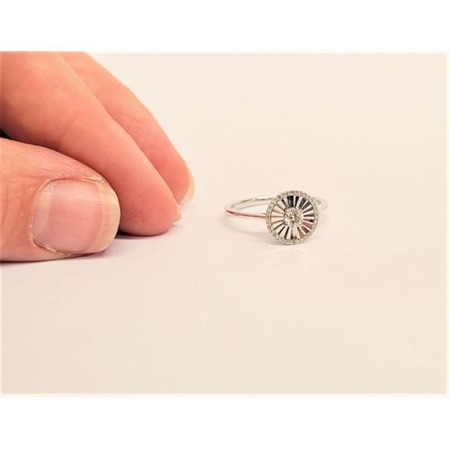 33 - A FANTASTIC 14CT WHITE GOLD & DIAMOND SUNBURST COCKTAIL RING, a centrally placed diamond is surround... 