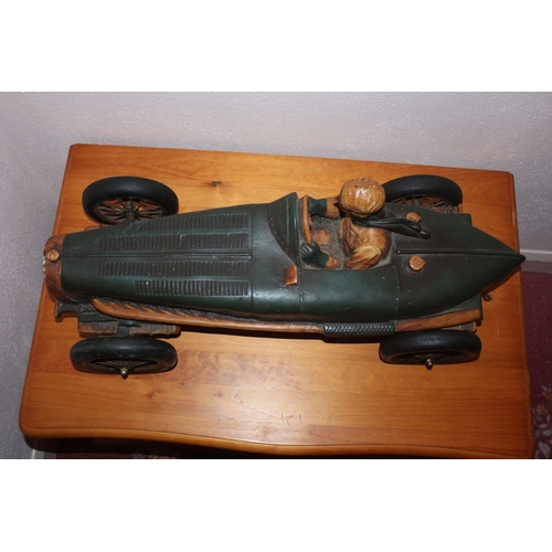 330 - A VINTAGE CARVED BUGATTI RACING CAR SCULPTURE, dimensions: 25cm x 65cm x 28cm approx.