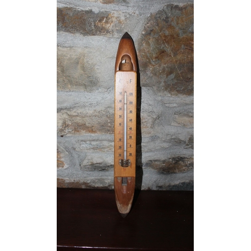 336 - A VINTAGE WOODEN LOOM SHUTTLE THERMOMETER, dimensions: 48cm x 4cm x 4.5cm approx.